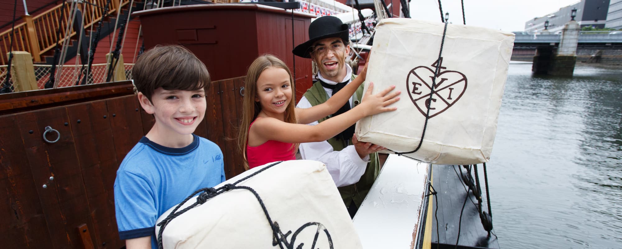Boston_Tea_Party_Ships_Museum_Kids_and_Tea_Crates_GBCVB-1