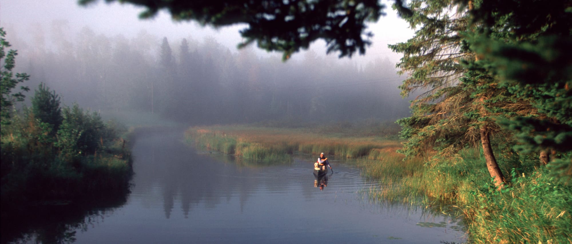 canoeing on a river near Ely