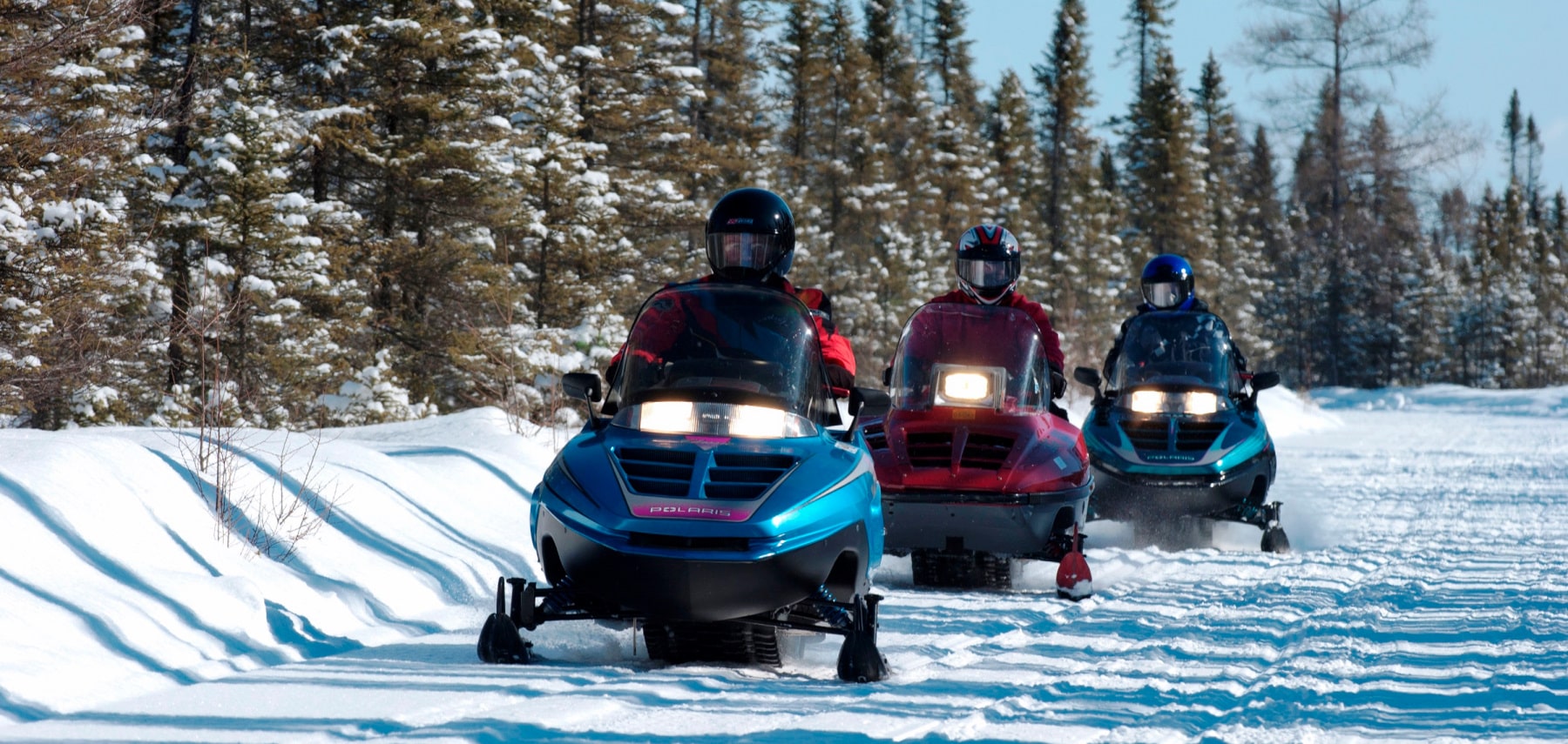 Snowmobiling on trails in Voyageurs national park