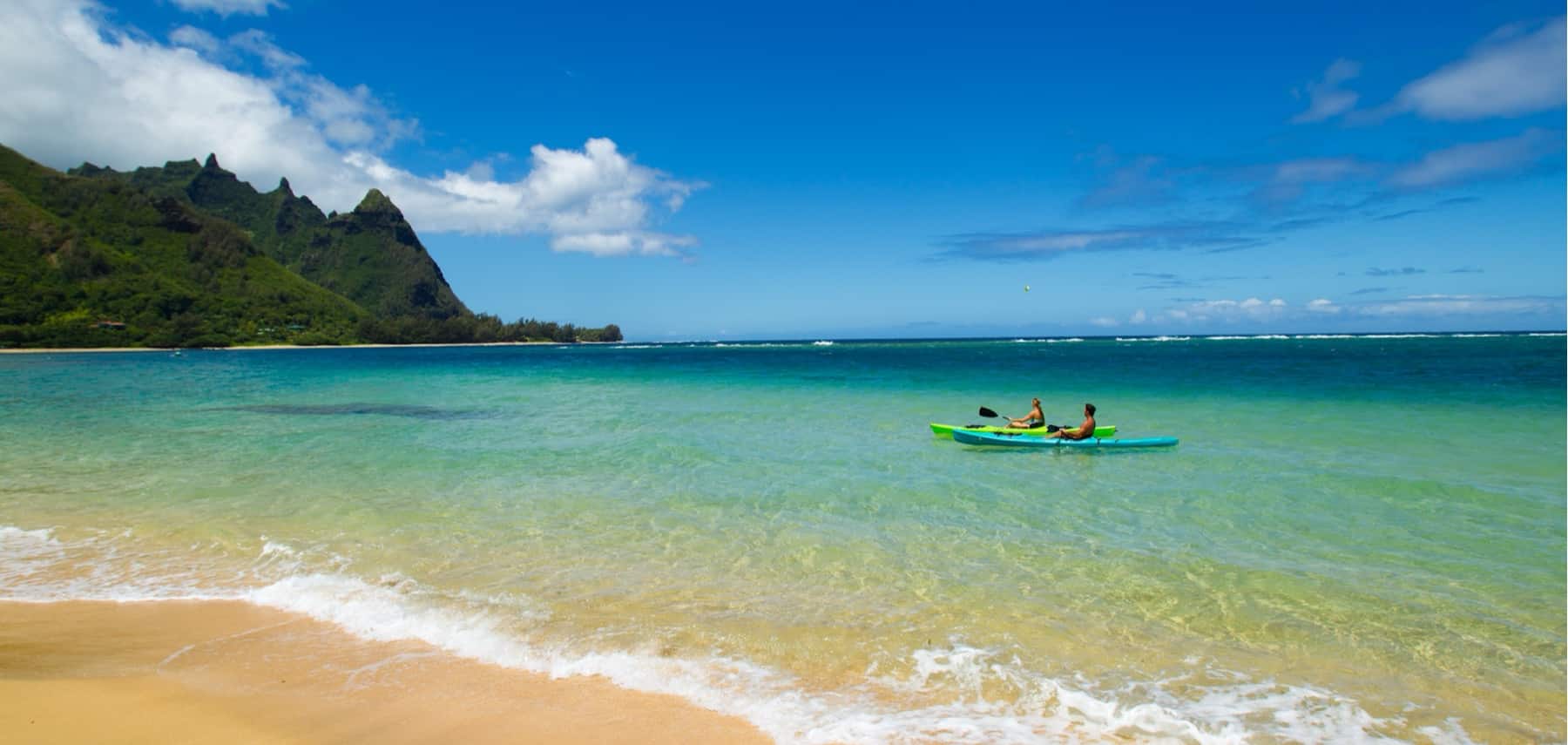 Couple kayaking at Makua beach