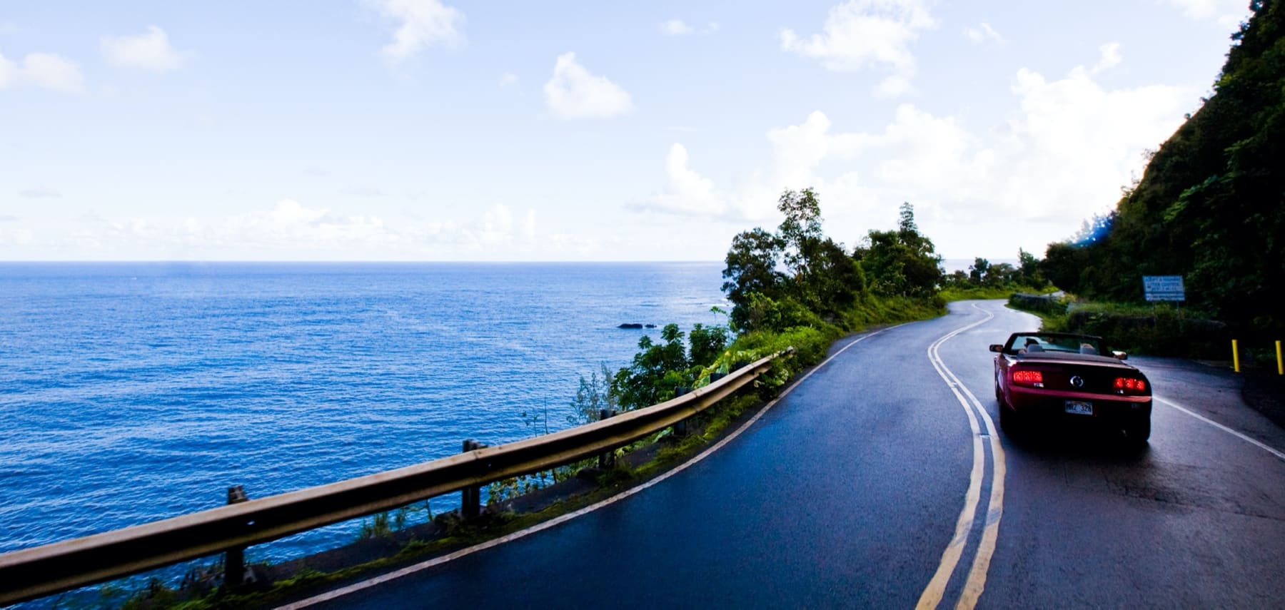 Driving the Hana coast in a convertible