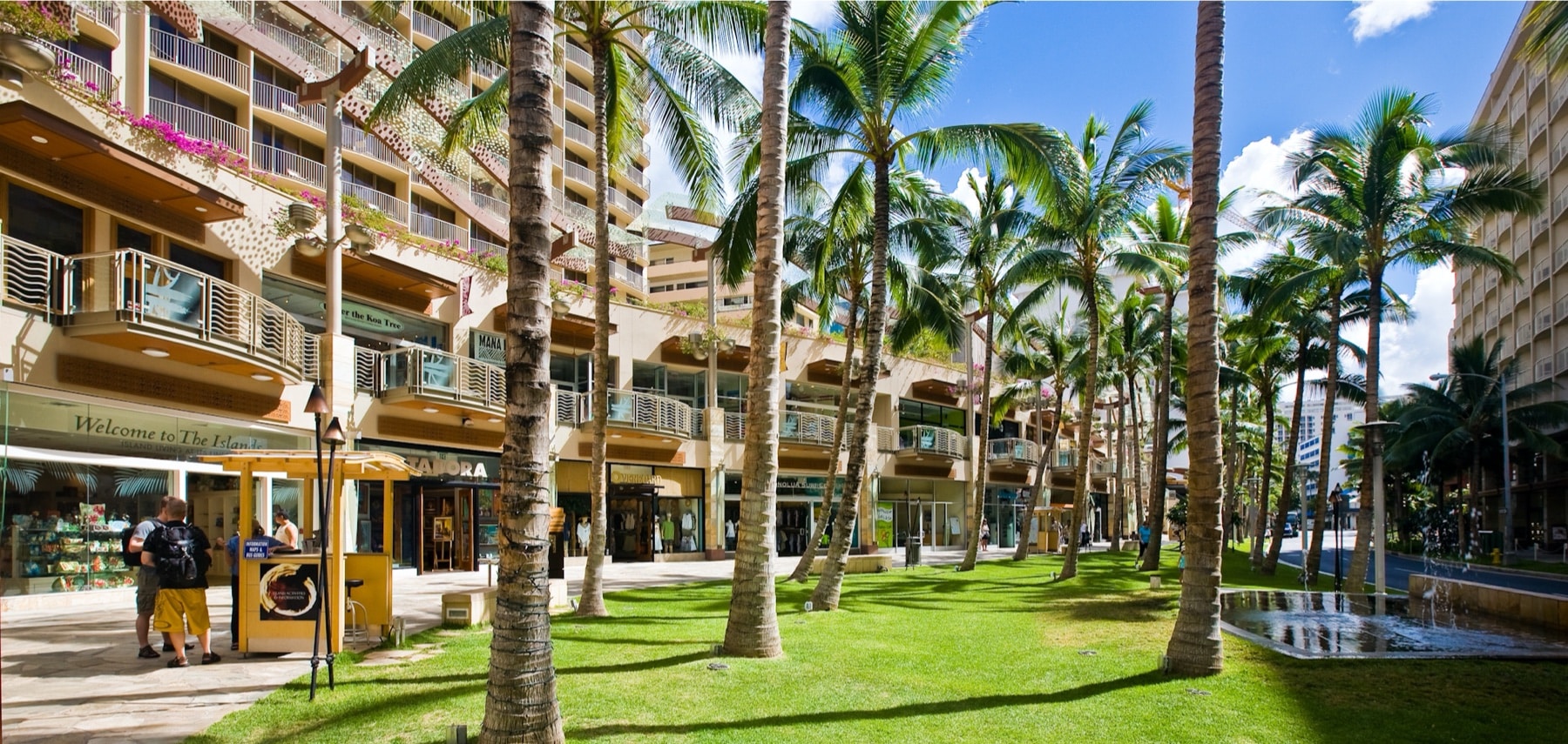 Street view of Waikiki Beach Walk shopping complex