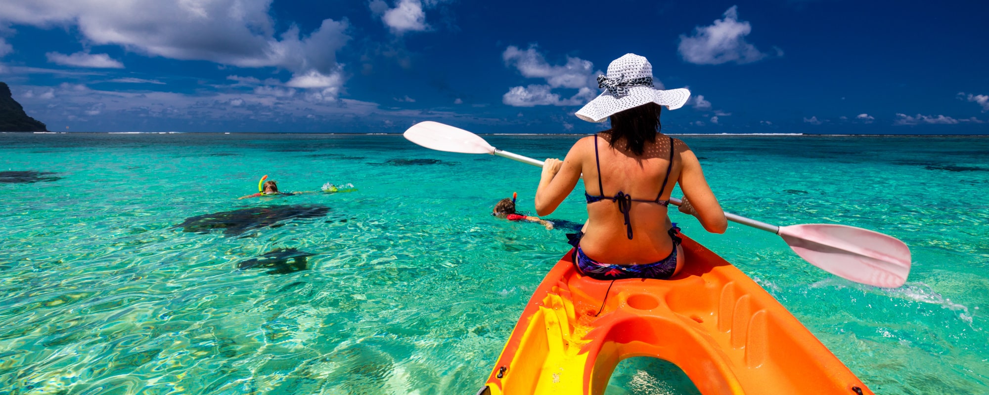Woman Kayaking in the lagoon of
